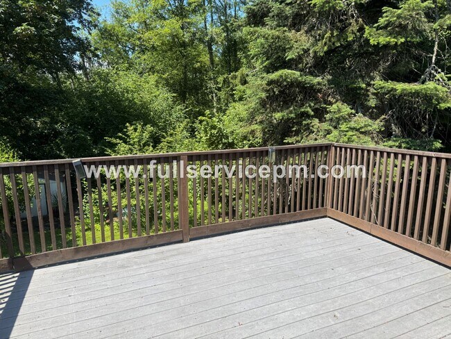 Building Photo - Spacious 4-Bedroom Upper-Level Home with Fireplace, Bonus Room & Large Deck