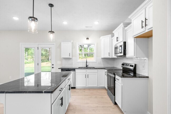 Building Photo - Brand New - 3 Bedroom 2 1/2 Bath Home For ...