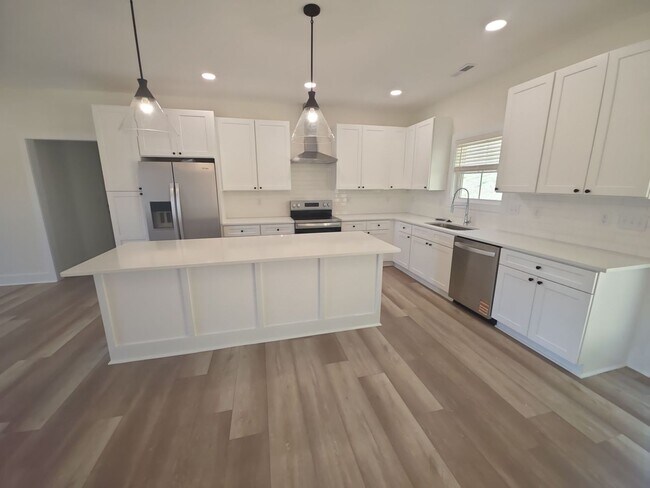 Building Photo - Brand-New 3-Bedroom Single-Level Home with 2-Car Garage and Maintenance-Free Living
