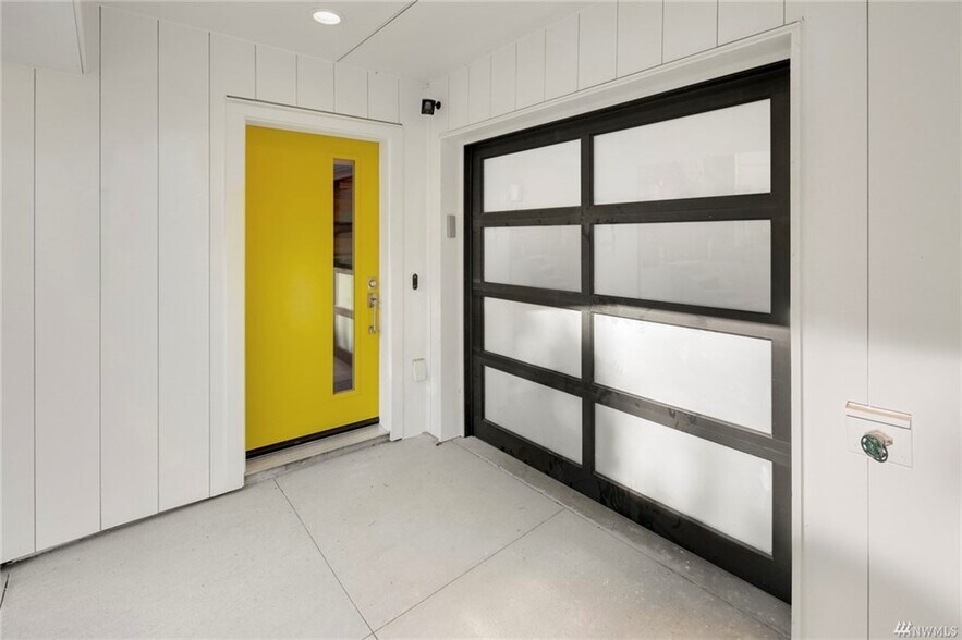 Glass garage door next to entry. - 818 N 47th St