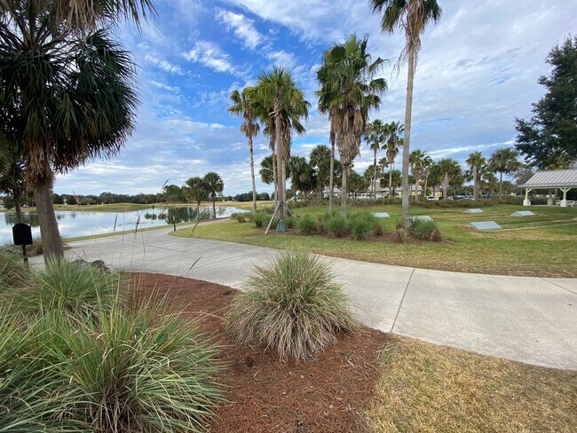 Building Photo - SEASONAL RENTAL. Large 4 Bed + 4 1/2 Baths Home, w/Views of the Jacaranda Golf Course and Lake in...