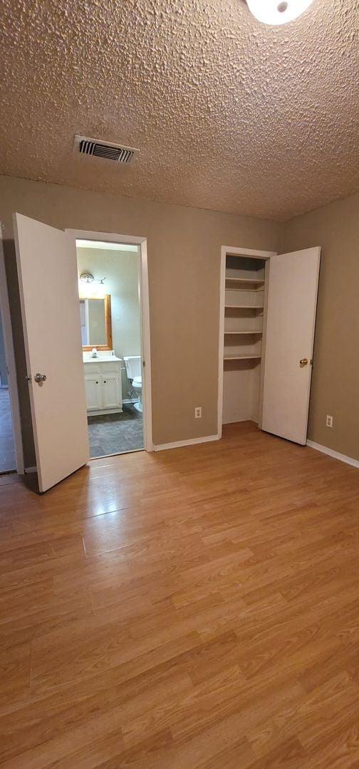 Building Photo - 3 Bedroom and 2 Bath Duplex with Carport a...