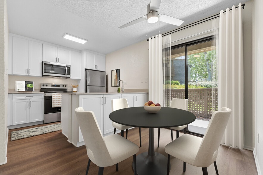 Renovated Package I kitchen and dining room with hard surface flooring - eaves South Coast