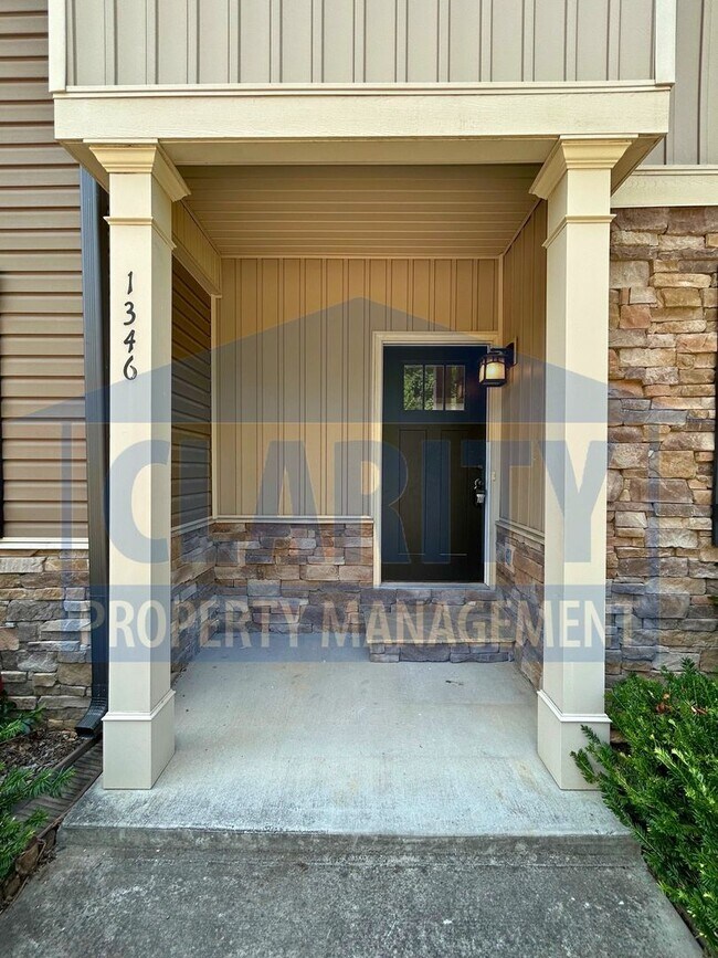 Building Photo - Modern 2-bedroom, 2.5-bath townhome
