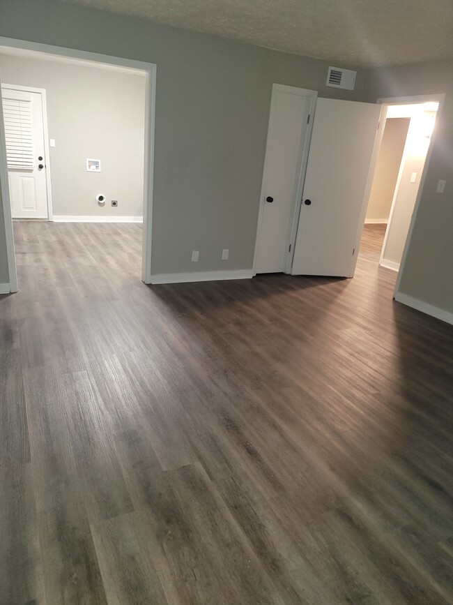 Living Room / Kitchen View - 393 Stone Mountain St