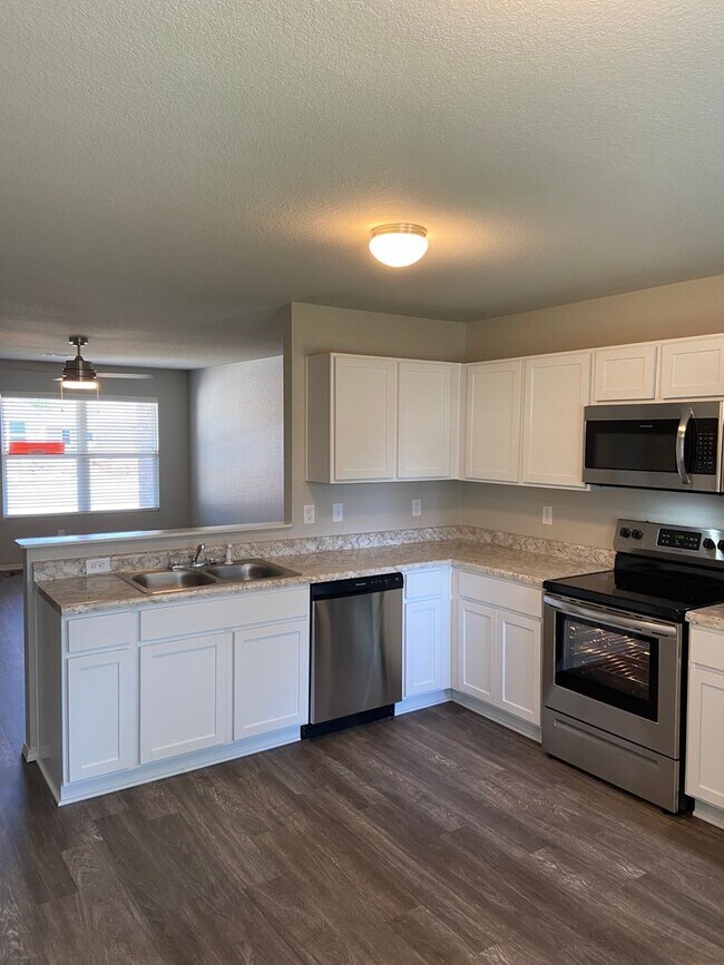 Building Photo - *Pre-leasing* Three Bedroom | Two Bath Home in Conrad Court