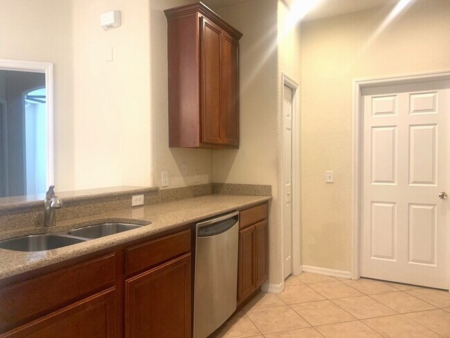 Building Photo - GATED COMMUNITY WITH COMMUNITY POOL