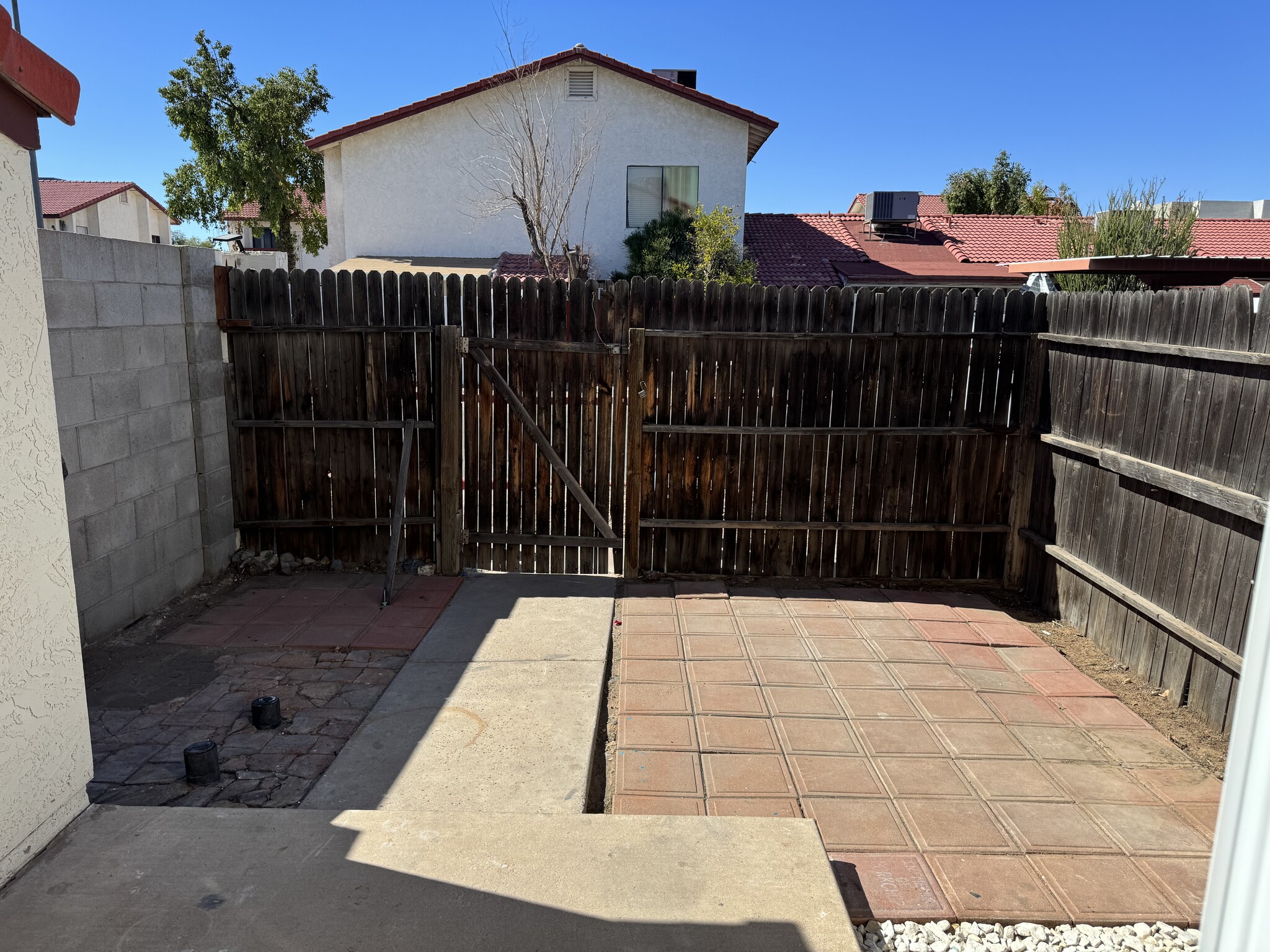 Backyard patio leading to reserved parkig - 2832 E Waltann Ln