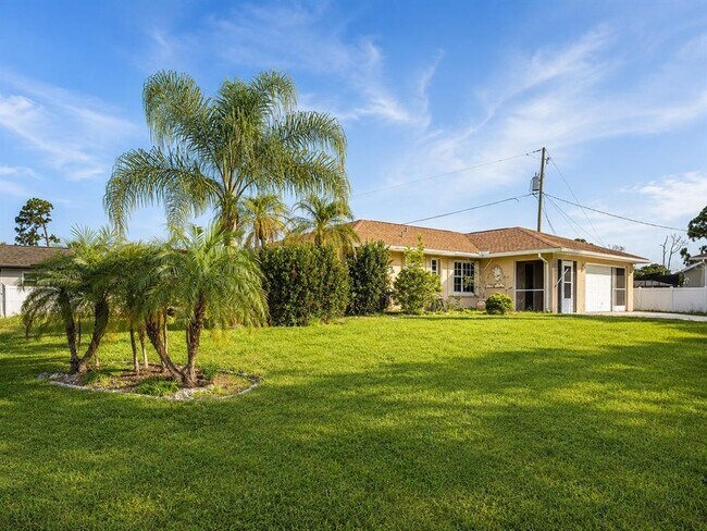 Building Photo - 440 W Tarpon Blvd NW