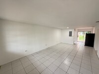 Building Photo - SPACIOUS 2 BD 1 BATH UNIT WITH LARGE BACKYARD