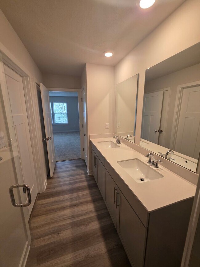 Building Photo - Luxury 4-Bedroom Townhome with Finished Walkout Basement & River Views