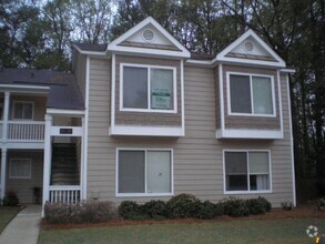 Building Photo - UPDATED CONDO IN SWIM/TENNIS COMMUNITY IN ...