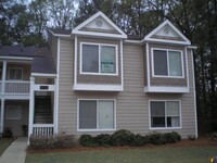 Building Photo - UPDATED CONDO IN SWIM/TENNIS COMMUNITY IN ...