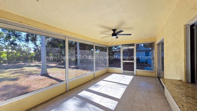 Building Photo - SPACIOUS SARASOTA HOME WITH LARGE FENCED YARD! MOVE IN READY! ALL TILE/ NEW LVP!