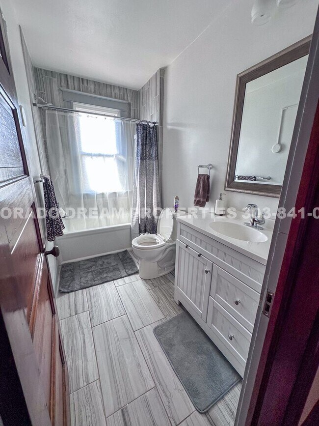 Building Photo - A home where old-world charm meets modern sophistication!