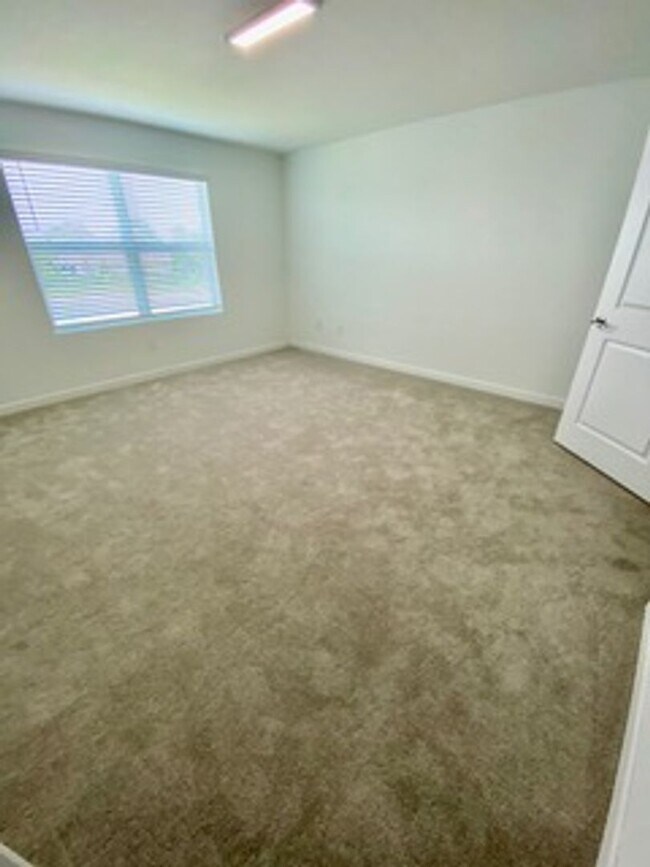 Building Photo - Brand new Townhome centrally located in La...
