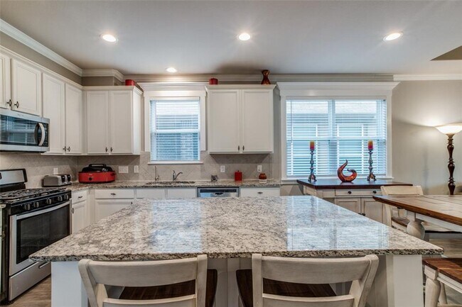 Building Photo - Looking for your first home or your forever home, the open floor plan on this beautiful home in t...