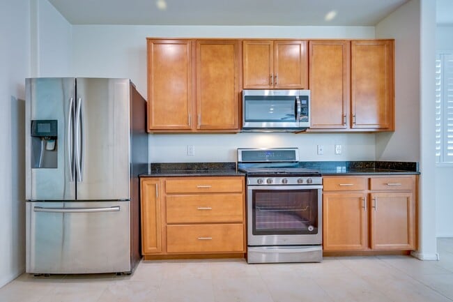 Building Photo - Green Valley!! Gated!! 4 Bedrooms!! Bed & Bath Downstairs!!  TANKLESS WATER HEATER!!! Covered pat...