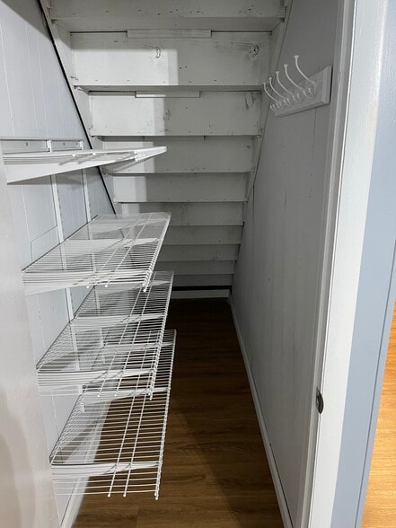 Enjoy a nice pantry with shelving just off the kitchen. - 6 Catawba Ave