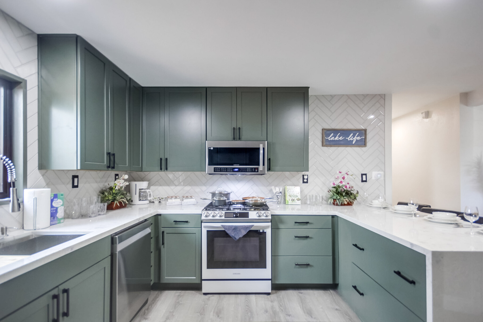 This kitchen has it all - from sleek, modern design to the top-of-the-line appliances - 5551 Churchward St