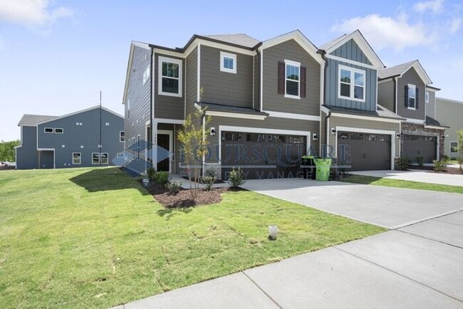 Building Photo - End-Unit Townhome with Loft, Open Floor Plan & Patio, Conveniently Located Near Dining, Shopping,...