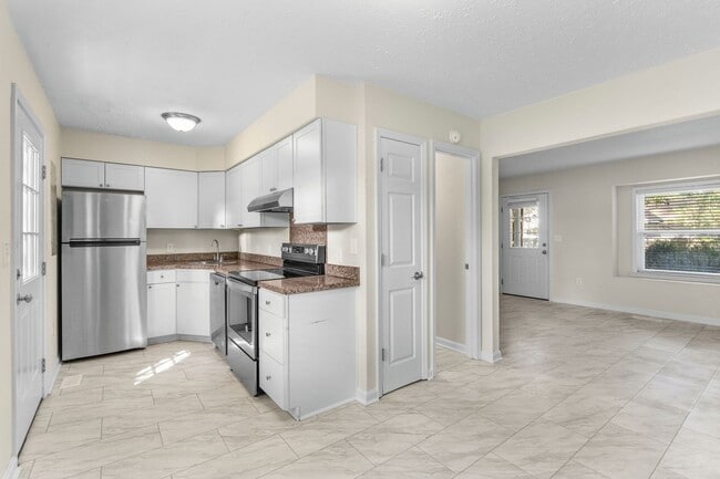 Primary Photo - End unit of a Triplex within walking dista...