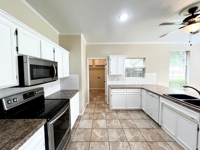 Building Photo - Available NOW!!!! This beautiful 2 story, 4 bedroom, 2 bath, two car garage with garage door open...