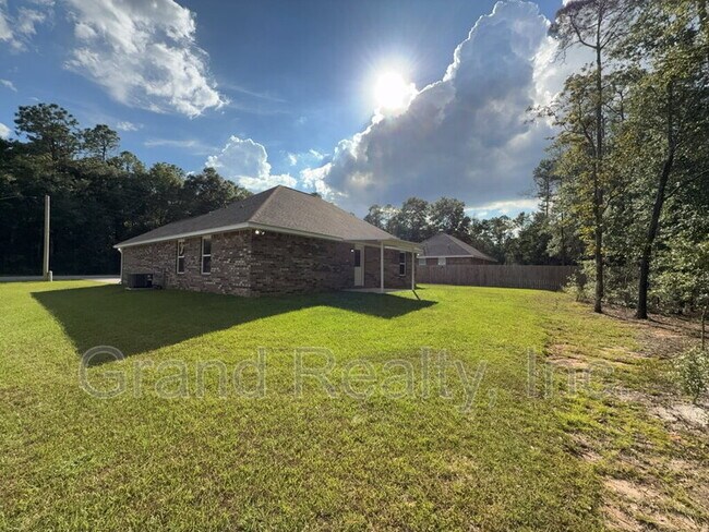 Building Photo - 6902 Trailride N