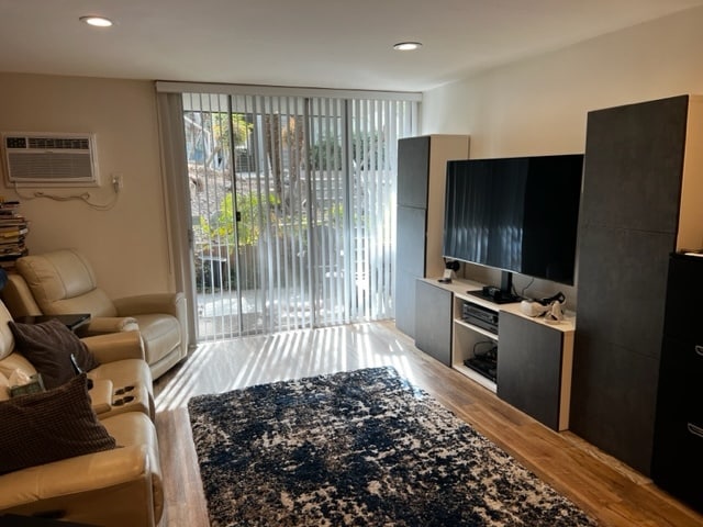 living room with TV - 4545 Collwood Blvd