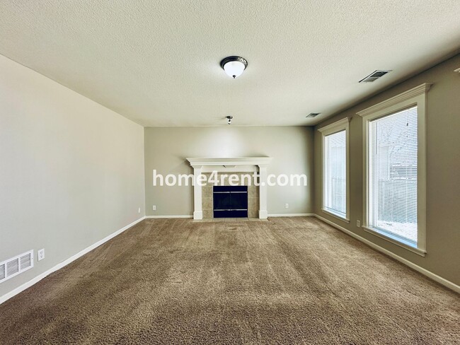 Building Photo - Spacious Four Bedroom Northland Home with a Finished Basement, 3 car garage and Fenced Yard!