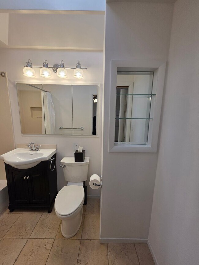 Building Photo - Delightful Single Story 2/2 with Expanded Bath and Beautiful Gardens