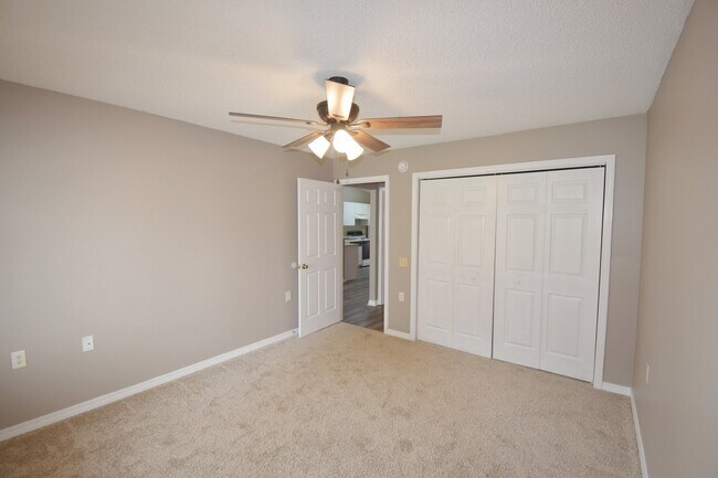 Building Photo - 2BR Patio Home with Open Layout, LVP Flooring, Private Fenced Yard, HOA Lawn Care & Convenient Bl...