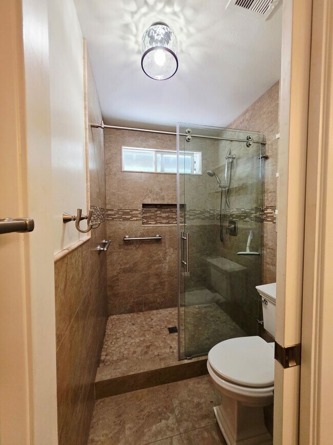 Building Photo - Spacious, Updated 4BR/2BA Oceanside Home | 3-Car Garage | Large Backyard