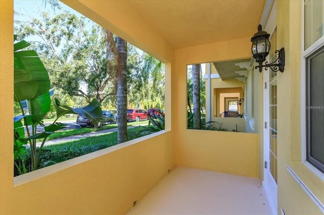 Front porch with pond view - 8438 Gilford Ln