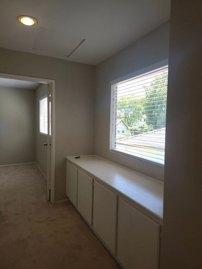 Building Photo - Light-Filled End Unit Condo, 2BD/2.5BA wit...