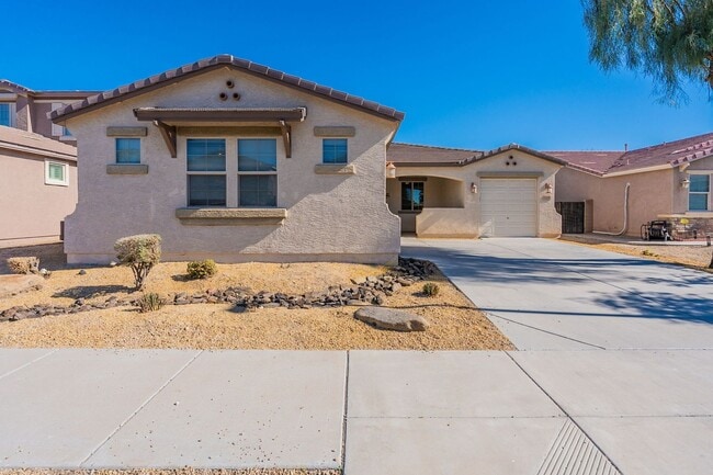Building Photo - Four Bedrooms, 3 Car Garage - New flooring!