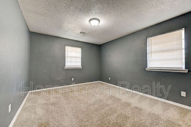 Building Photo - 8616 N Harvey Ave