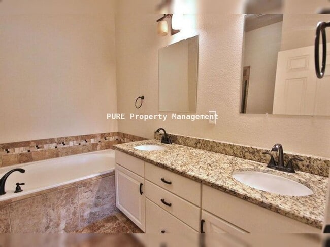 Building Photo - Large patio home with partially finished basement, attached 2-car garage!