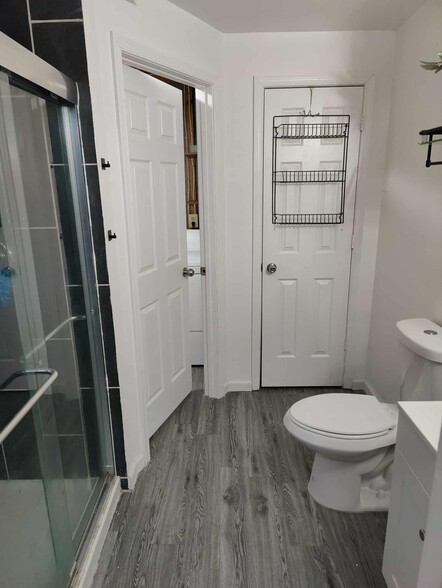 Bathroom (basement) passage to laundry room and closet - 11573 Overleigh Dr