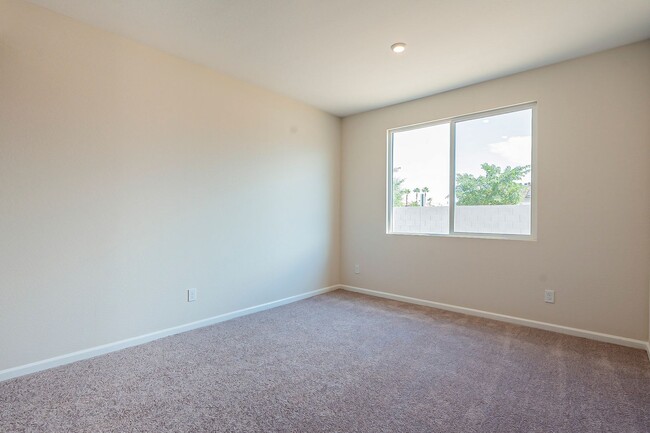 Building Photo - Beautiful New Spacious Home Includes 3 car...