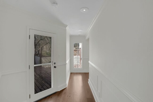 Building Photo - NOT YOUR AVERAGE 4 BEDROOM HOUSE!