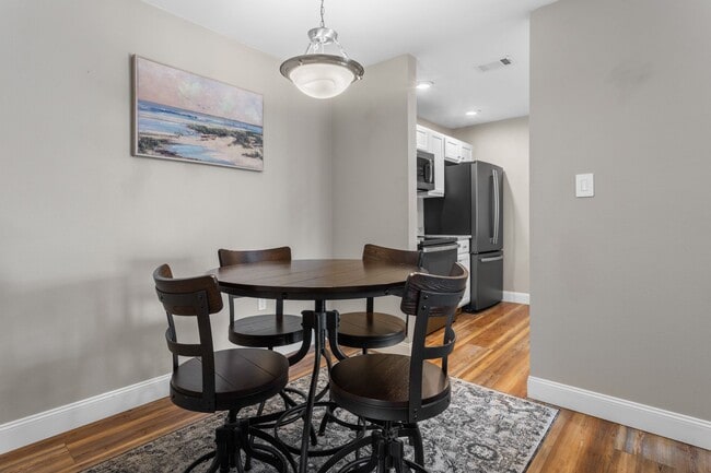 Building Photo - Welcome to Coastal Living at Harbor Landing Condominiums!