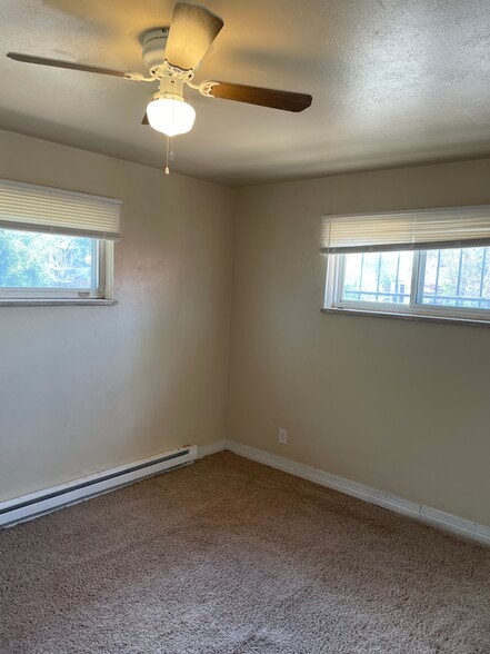 master bedroom with ceiling fan - 1995 Kingston St