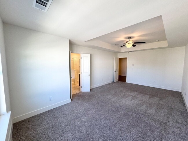 Building Photo - Stylish 3BR Townhome with Private Yard & T...