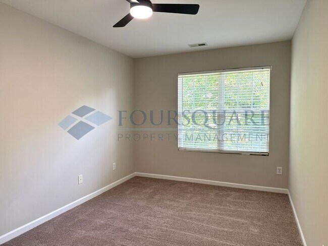 Building Photo - Lovely 3-Bedroom Townhome with Fireplace, Back Patio  & Community Amenities Included! Convenient ...