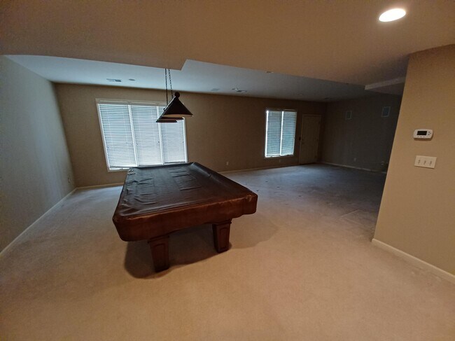 Pool table not included but the huge finished basement is! - 6003 N Norton Ave
