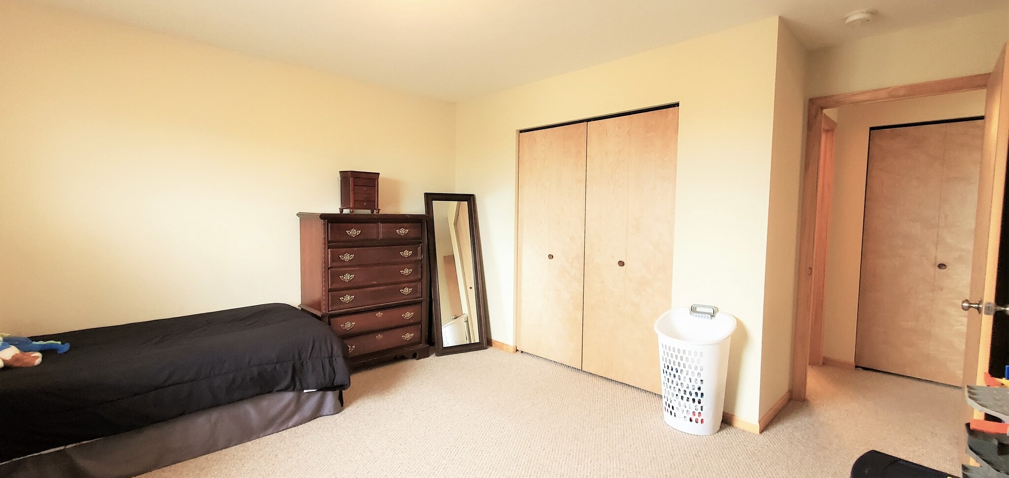 Bedroom 2/upper level. (photo from neighboring unit with the same layout) - 1756 St Joseph St