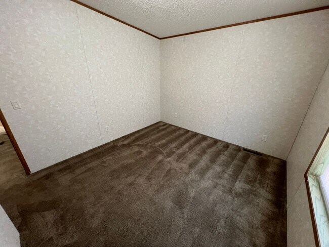 Building Photo - 3 Bedroom 2 Bath Modular Home with Many Amenities & Storage Shed