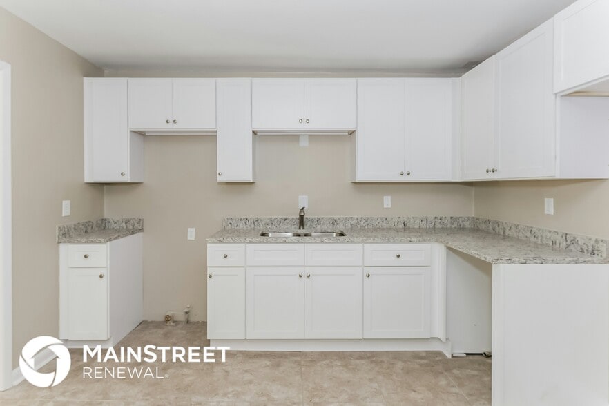 Building Photo - 6104 Holiday Blvd