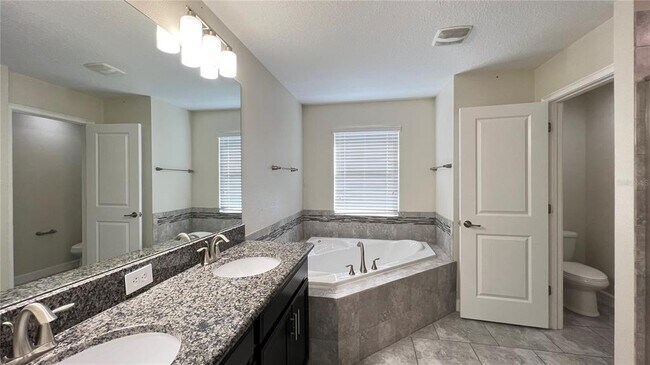 Building Photo - 7755 Purple Finch St